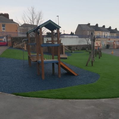 AGI Playgrounds with safety mats and artificial grass